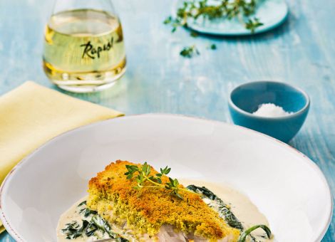Fischfilet mit Kräuterkruste  auf Rahmspinat